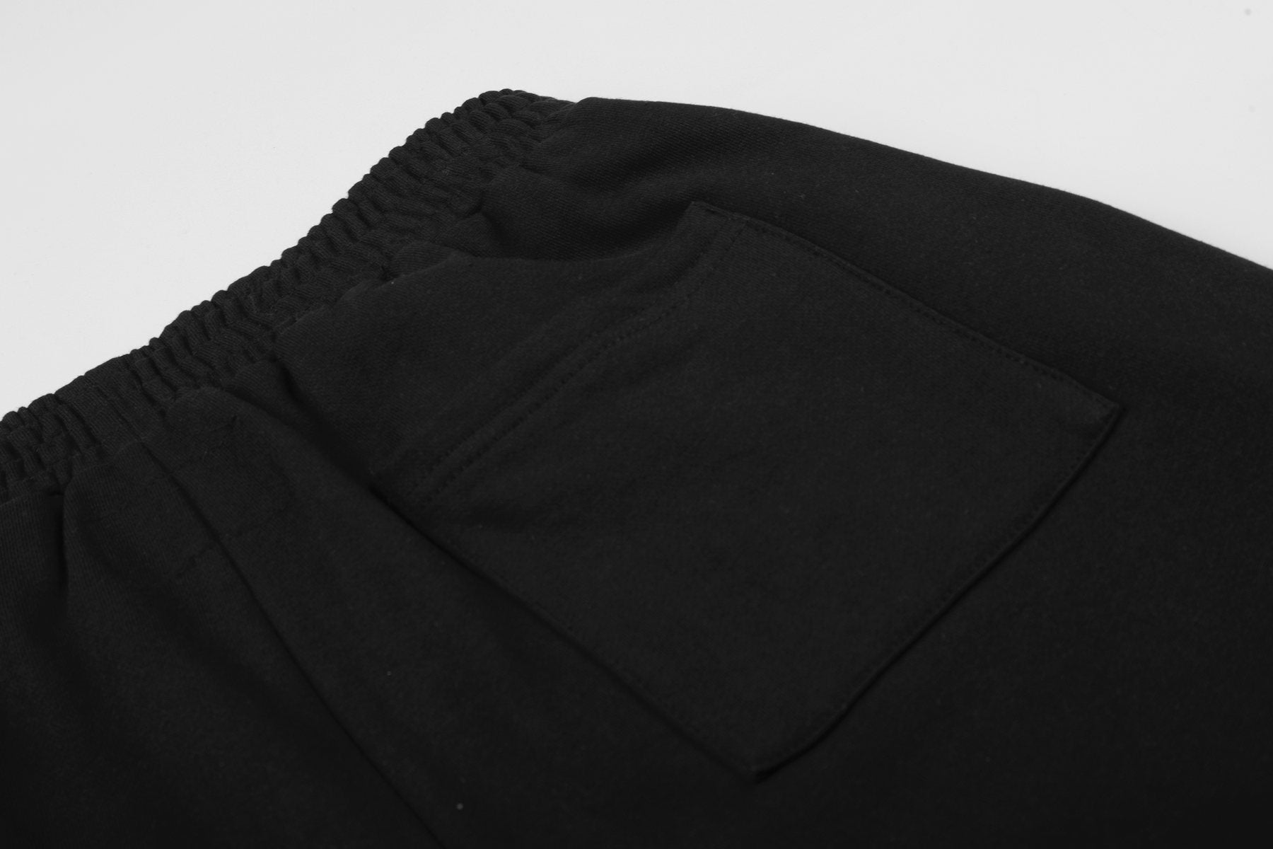 Sp5der Curved Wordmark Raw-Hem Shorts — detail